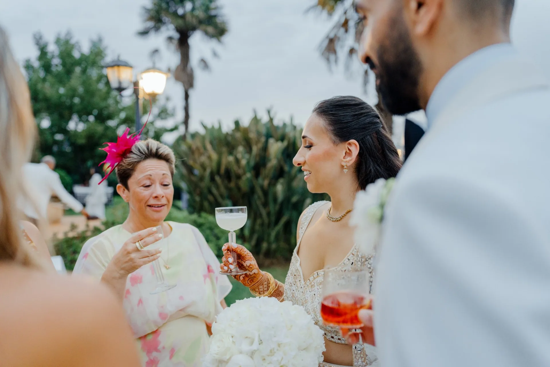 People celebrating and raising their glasses